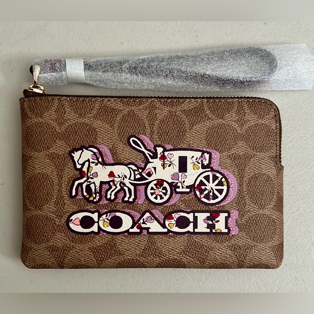 Coach Tan Wristlet with Horse and Carriage Motif